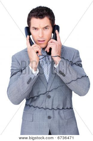 Arg affärsman härva upp i telefonen sladdar