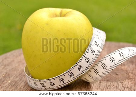 Apple and tape measure