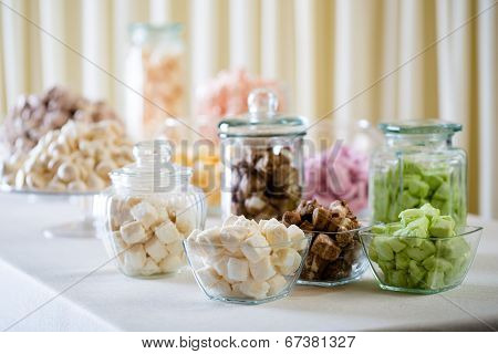 Marshmallow and meringue at white table
