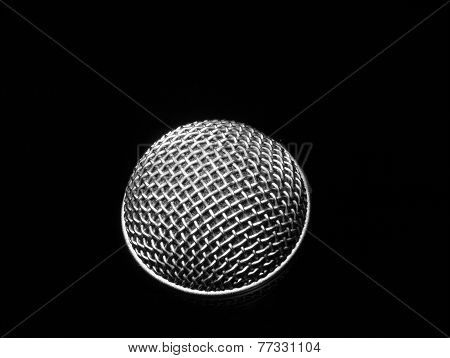 Silver Microphone On A Black Background.