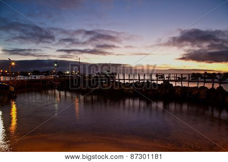 Amazing sunset along the port in San Cristobal island, Galapagos