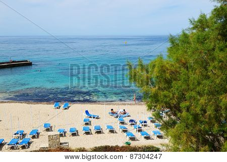 Crete, Greece - May 11: The Tourists Enjoiying Their Vacation On The Beach On May 11, 2014 In Crete,