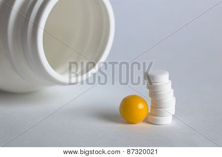 Vitamine Dragee Hitting Pile Of Medical Pills