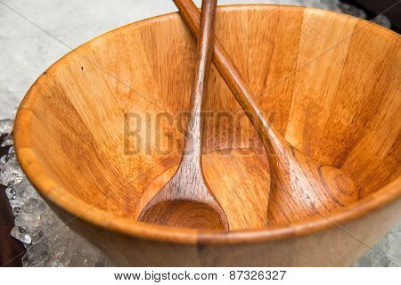 Wood Bowl And Spoons On Atable
