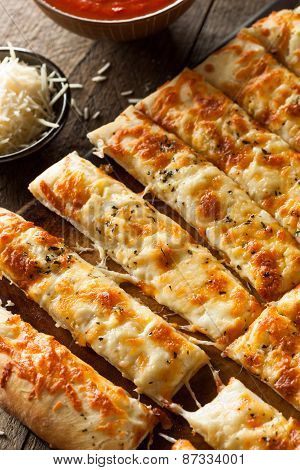 Homemade Cheesy Breadsticks With Marinara