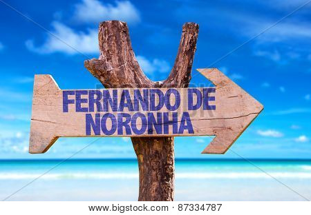 Fernando de Noronha wooden sign with beach background