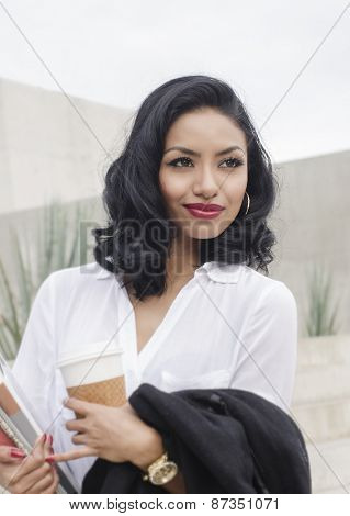 Woman in business clothing looking satisfied
