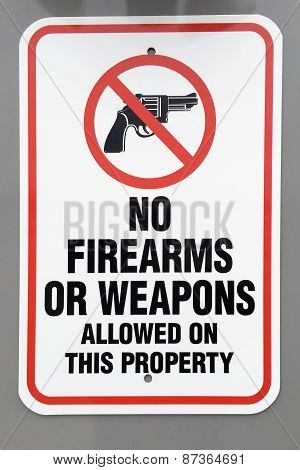 No firearms or weapons warning sign