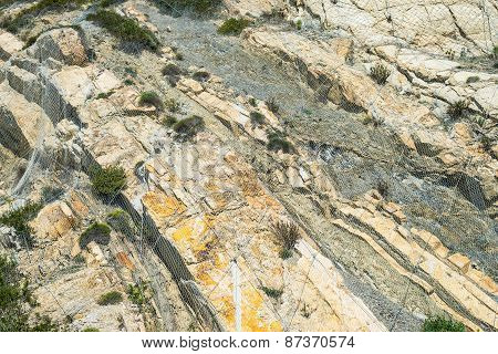 Rockfall Protection Netting On Cracked Rocks