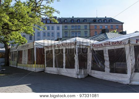 MUNICH, GERMANY - JUNE 04, 2015: Closed sales stall at Viktualienmarkt in Munich a typical farmer's market