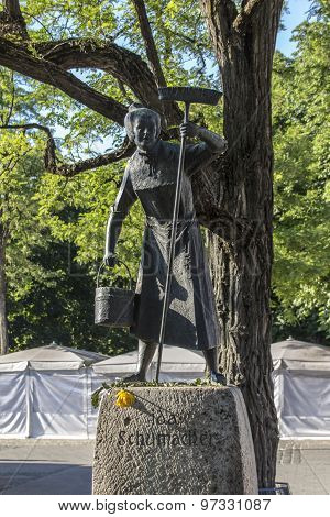 MUNICH, GERMANY - JUNE 04, 2015: Statue of Ida Schumacher at the Viktualienmarkt in Munich a typical farmer's market