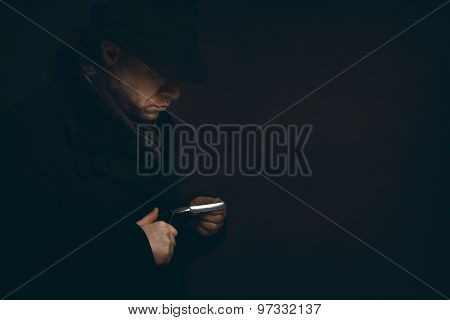 Man With A Razor Is Waiting In The Dark