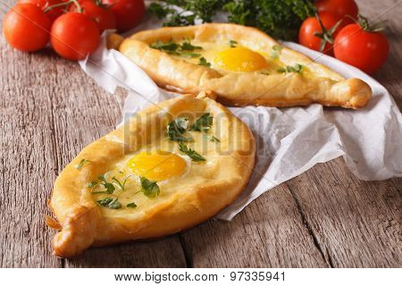Ajarian Khachapuri And Fresh Vegetables Close-up. Horizontal