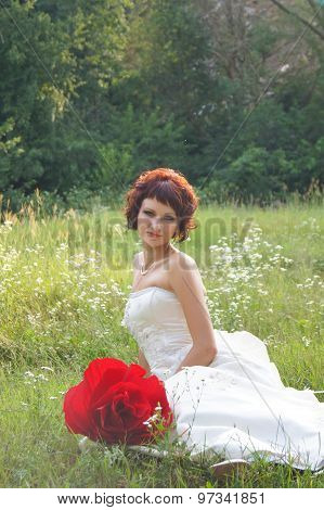 Young beautiful girl in a wedding dress