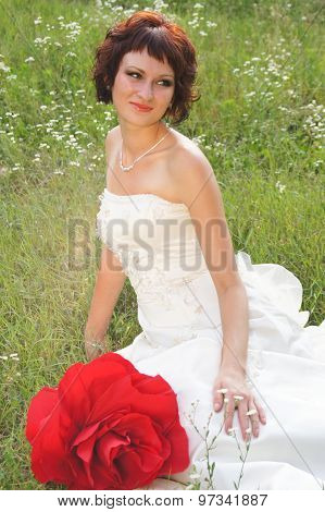 Young beautiful girl in a wedding dress