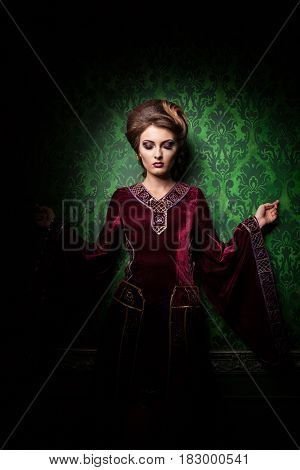 Gorgeous beautiful woman dressed vintage clothes in retro interior. Rococo period. Luxury and high class
