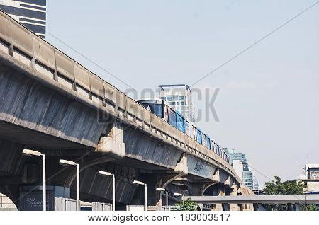 Bts Sky Train Mass Transit System ,moving To Arrive In Platform Of Central Business Area Of Bangkok.