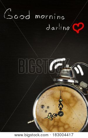 Retro alarm clock with coffee. Morning coffee after waking up. Wake up. Place for ad text.