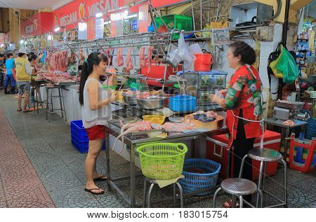 HO CHI MINH CITY VIETNAM - NOVEMBER 26, 2016: Unidentified people visit Ben Thanh market.