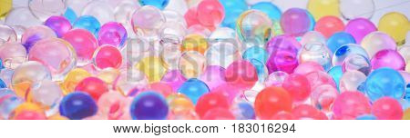 transparent colored water balls texture close up