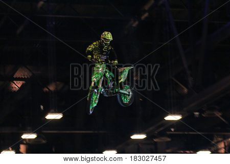 St. Petersburg Russia - 15 April, A biker performing a trick,15 April, 2017.
International Motor Show IMIS-2017 in Expoforurum.
Moto show at the St. Petersburg moto salon.