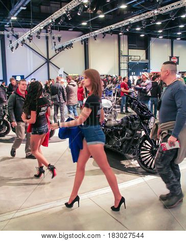 St. Petersburg Russia - 15 April, People on moto salon,15 April, 2017.
International Motor Show IMIS-2017 in Expoforurum.
Visitors and participants of the annual moto-salon in St. Petersburg.