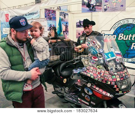St. Petersburg Russia - 15 April, Visitors and participants of moto salon,15 April, 2017.
International Motor Show IMIS-2017 in Expoforurum.
Visitors and participants of the annual moto-salon in St. Petersburg.