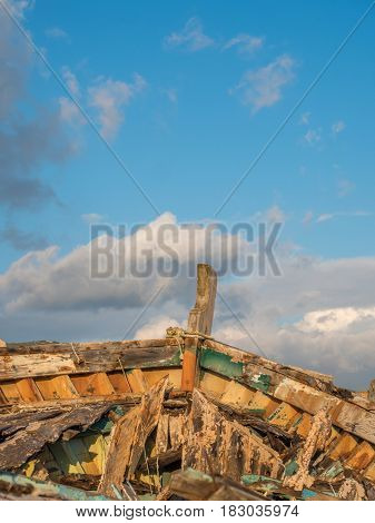 wreck boat on the road at Eleusis Greece