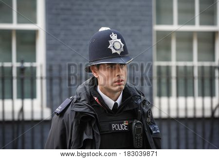 Metropolitan Policewoman On Duty In London