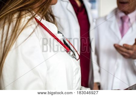 doctors talking about therapy and exams of a patient to decide how to proceed