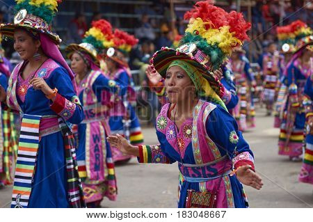 ORURO, BOLIVIA - FEBRUARY 26, 2017: Tinkus dancers in colourful costumes performing at the annual Oruro Carnival. The event is designated by UNESCO as being Intangible Cultural Heritage of Humanity.