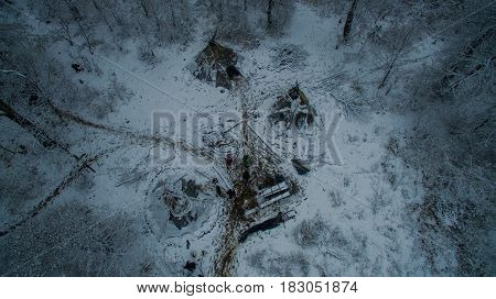 Aerial view near of Kinderlinskaya cave and village Tash-Asty on Zilim river. Life in the tipi at winter
