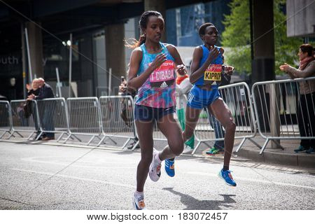 LONDON - APRIL 23, 2017: KIPROP, Helah and DIBABA, Tirunesh  run in the Virgin Money London Marathon on April 23, 2017 in Isle of Dogs. 