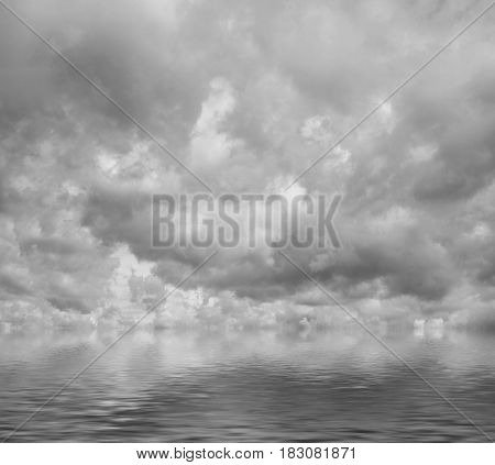 Grey clouds flying over sea cloudscape. Dramatic cloudy sky heaven.