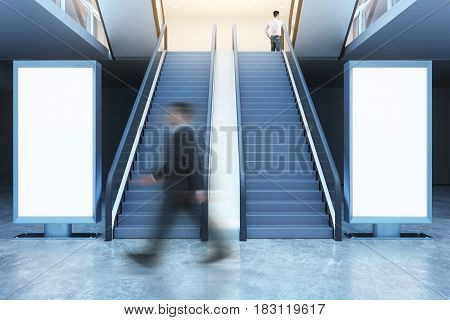 Man Walking Past Billboards
