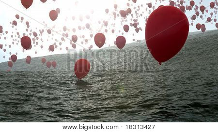 červené balóny nad oceánem