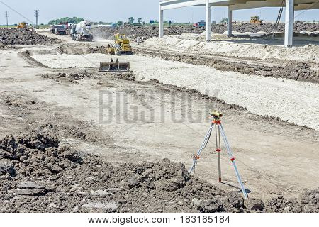 Surveyors ensure precise measurements before undertaking large construction projects.