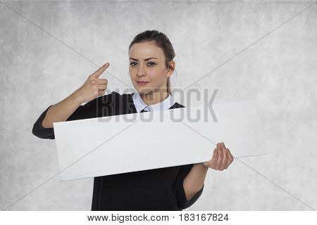 Beautiful woman holding a blank billboard space for link