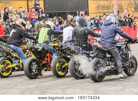 St. Petersburg Russia - 15 April, Bikers before the start,15 April, 2017.
International Motor Show IMIS-2017 in Expoforurum.
Sports motorcycle show of bikers on the open area.