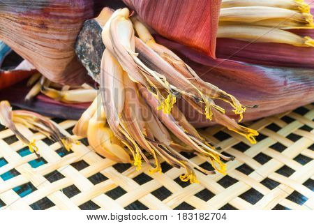 Closeup To Withered Flower Banana (edible) On Rattan Tray