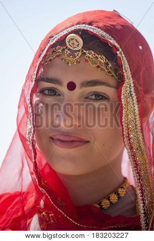 JAISALMER INDIA - FEBRUARY 09 2017 : Indian girl wearing traditional Rajasthani dress participate in Desert Festival in Jaisalmer Rajasthan India