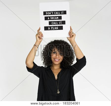 Afro woman holding paper with a message for motivation