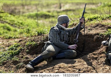 Rosowek Poland april 23 2017: German soldiers. Historical reconstruction soldiers fighting during World War II