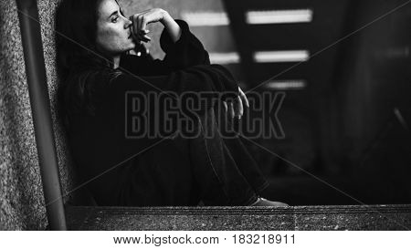 Adult Woman Sitting Look Worried on The Stairway