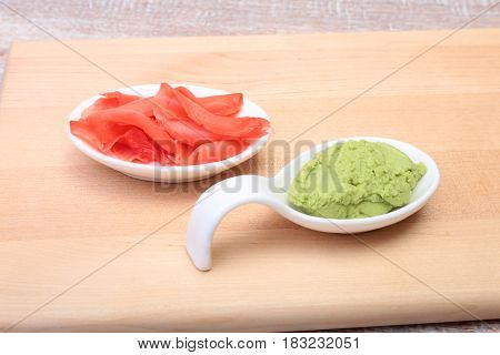 plate with Japanese wasabi sauce and pickled ginger