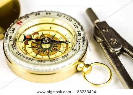 Old tourist compass with circinus on white background