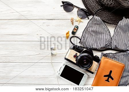 Hello Summer Vacation Concept Flat Lay. Stylish Swimsuit, Hat Sunglasses And Shells Passport Phone P