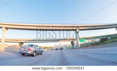 Denver Colorado USA-April 22 2017. POV point of view -Driving South in Interstate highway I25 at sunset.