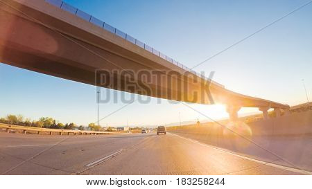 POV point of view -Driving South in Interstate highway I25 at sunset.