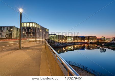 Bridge and office buildings at the river Spree in Berlin in the early morning